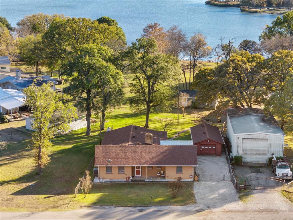 2097 County Road 3830 Quinlan, TX 75474 - Photo 1 of 38 an aerial view of a house with a ocean view