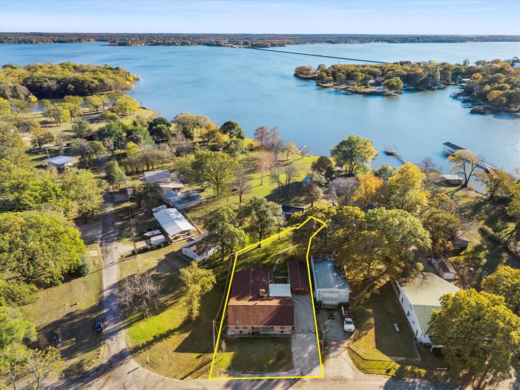 2097 County Road 3830 Quinlan, TX 75474 - Photo 36 of 38 a view of a lake with houses