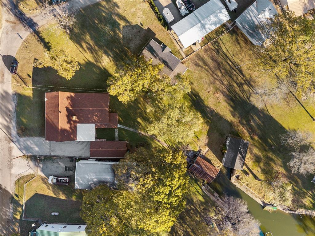 2097 County Road 3830 Quinlan, TX 75474 - Photo 8 of 38 an aerial view of residential houses with outdoor space
