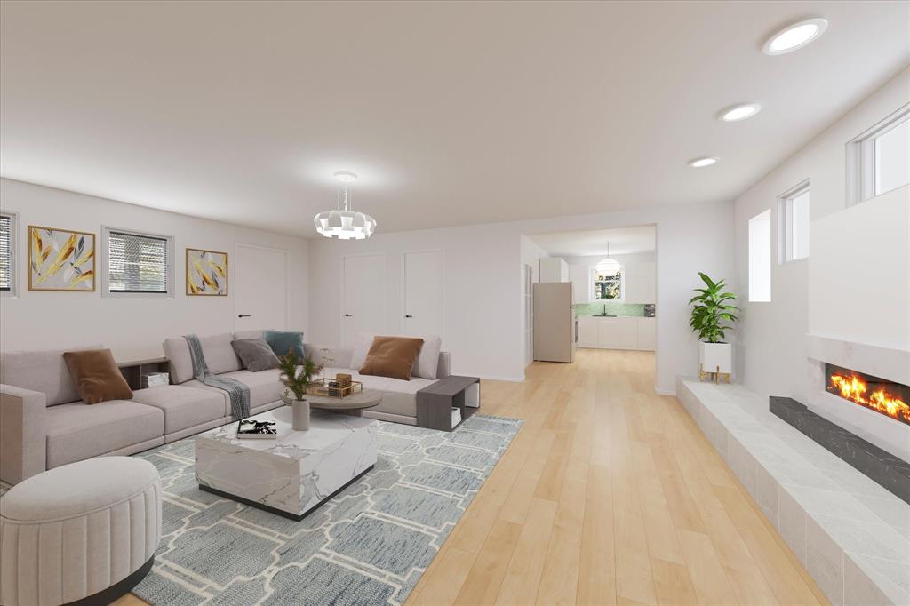2097 County Road 3830 Quinlan, TX 75474 - Photo 10 of 38 a living room with furniture and a potted plant