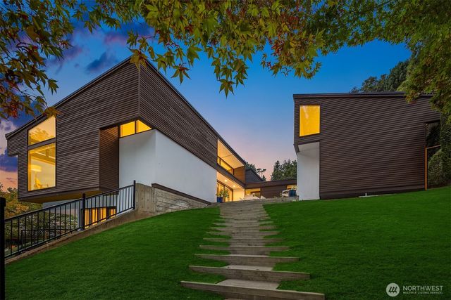 a backyard of a house with lots of green space