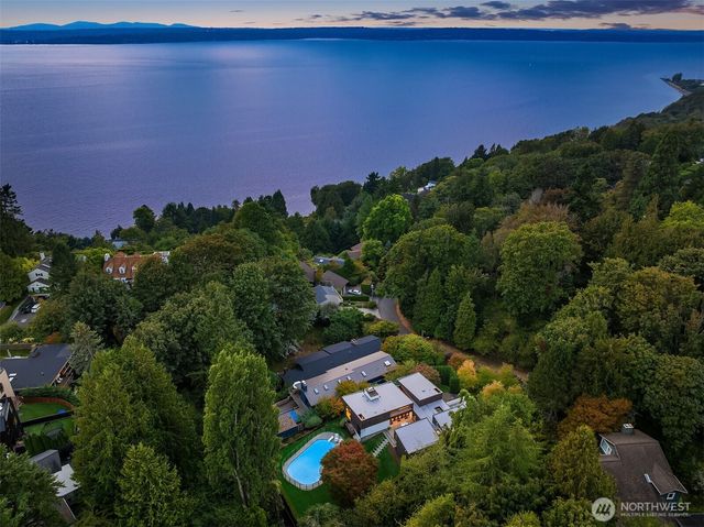 an aerial view of a house with a garden