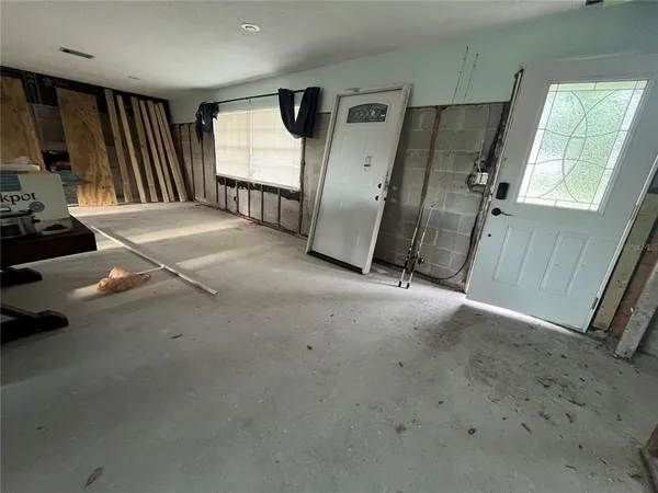 a view of a livingroom with a staircase