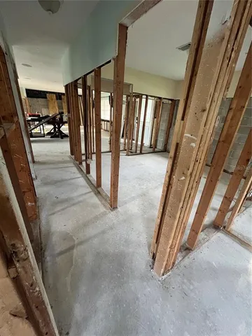 a view of a hallway with staircase