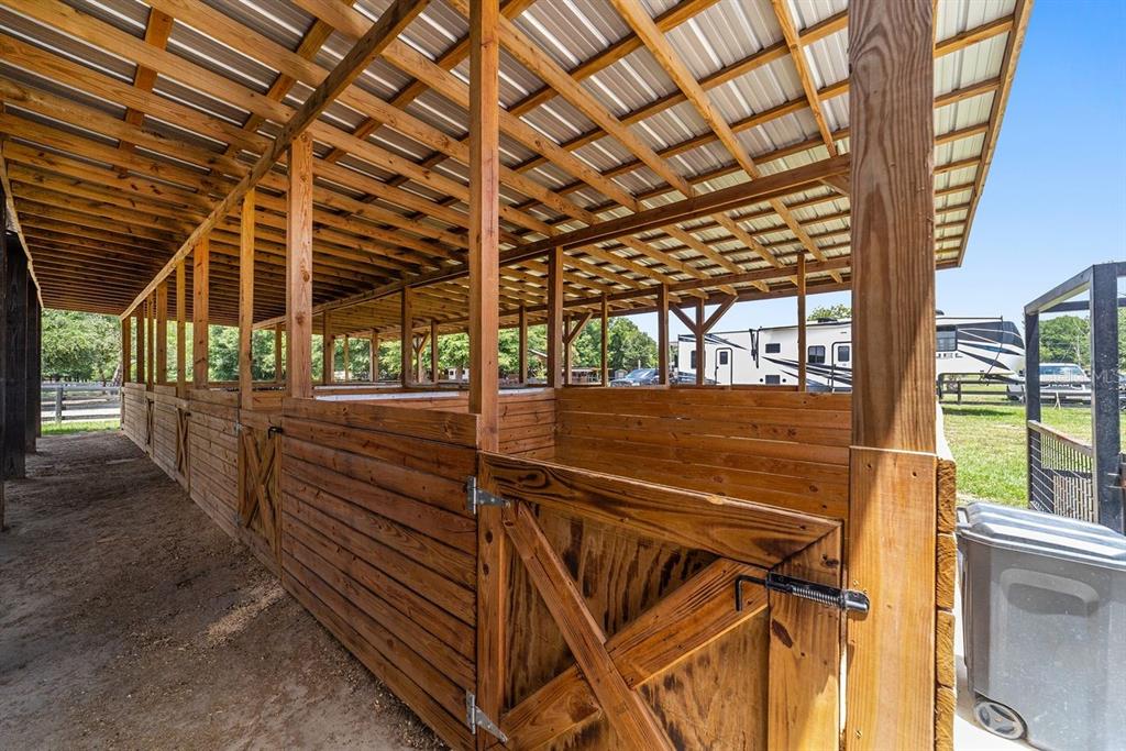 16392 Northeast Jacksonville Road Citra, FL 32113 - Photo 21 of 44 a view of room with wooden floor