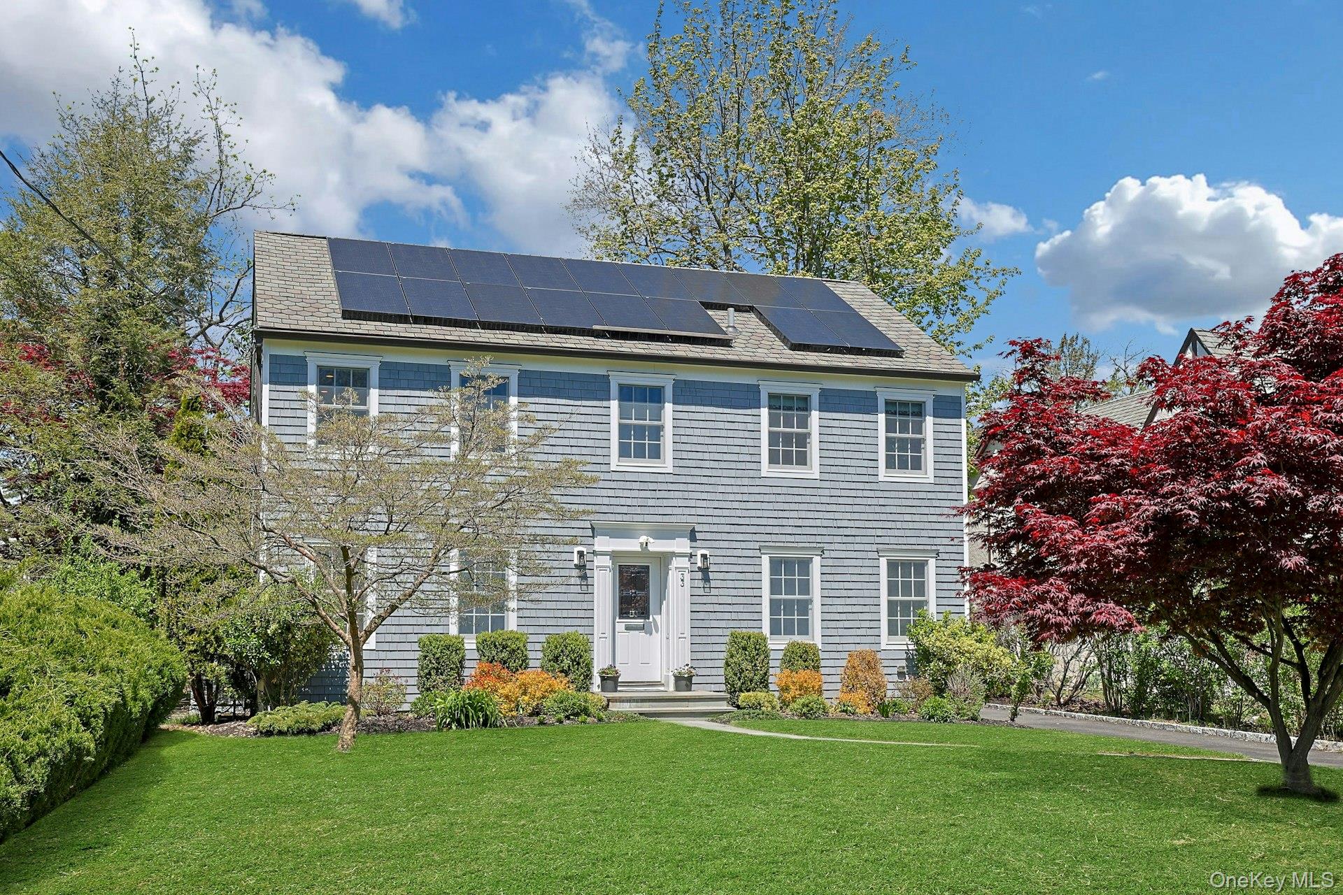 33 Lawrence Road Scarsdale, NY 10583 - Photo 1 of 8 Classic center-hall Colonial set on a peaceful, tree-lined street in the heart of Heathcote, offering timeless curb appeal and cost-effective solar panels to be fully conveyed by the seller.