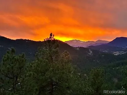 a view of mountains and valleys