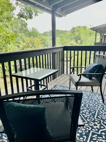 a view of a swimming pool with a lounge chairs