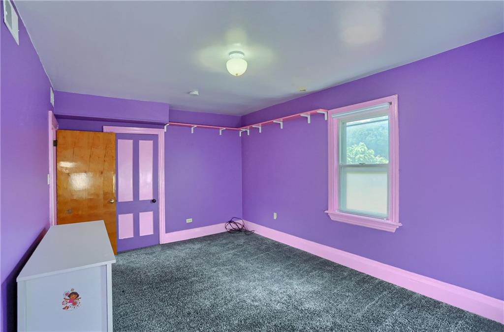 516 17th Street Beaver Falls, PA 15010 - Photo 17 of 28 a view of a livingroom with a workspace