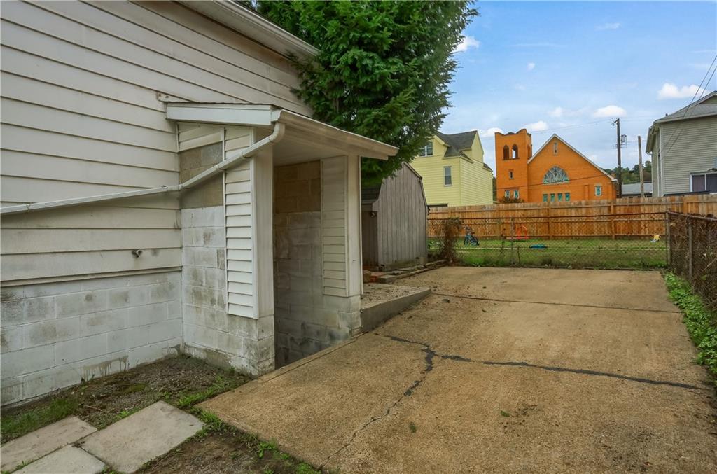 516 17th Street Beaver Falls, PA 15010 - Photo 4 of 28 a view of back yard of the house