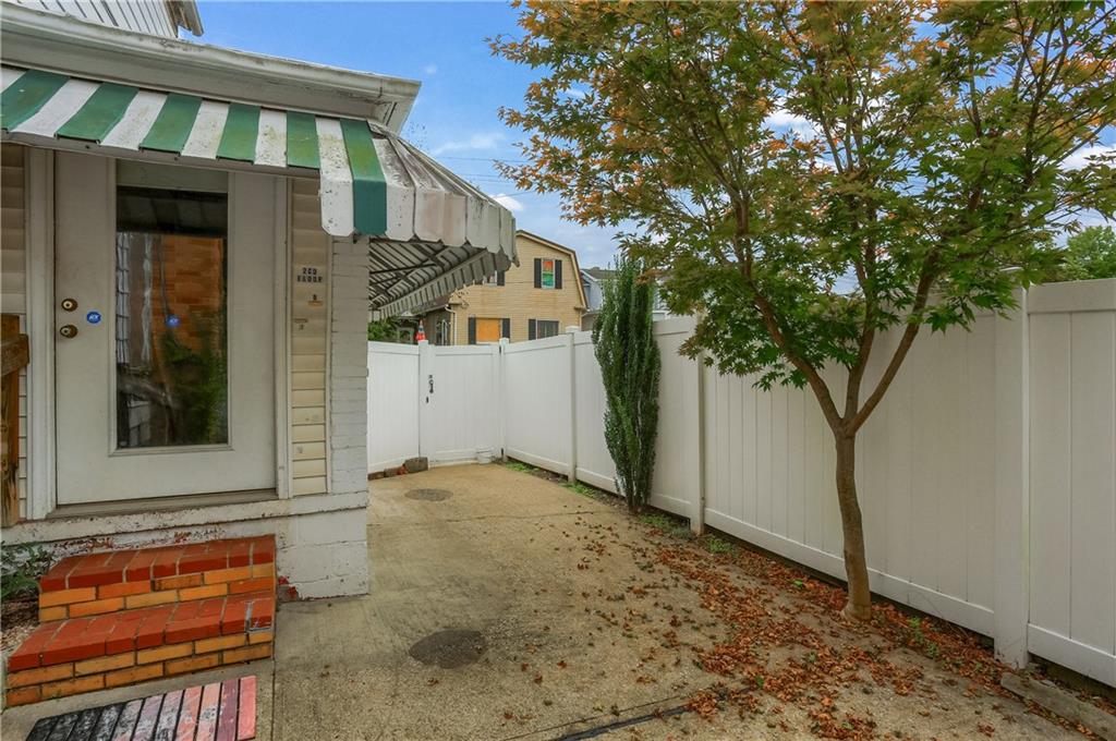 516 17th Street Beaver Falls, PA 15010 - Photo 5 of 28 a view of a house with a tree