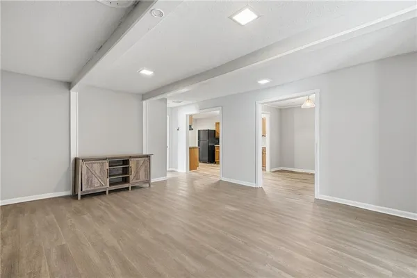 a view of a livingroom with furniture and wooden floor