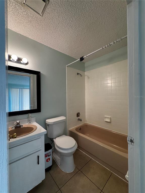 1755 Southwest 108th Lane, Unit 2 Ocala, FL 34476 - Photo 16 of 16 a bathroom with a toilet a sink and bathtub