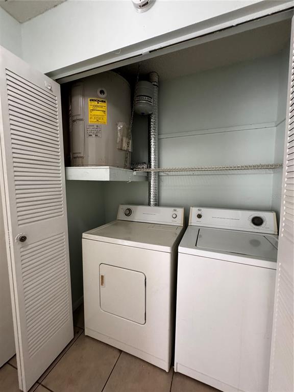 1755 Southwest 108th Lane, Unit 2 Ocala, FL 34476 - Photo 8 of 16 a utility room with dryer and washer