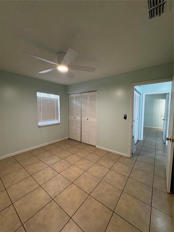 1755 Southwest 108th Lane, Unit 2 Ocala, FL 34476 - Photo 10 of 16 a view of an empty room and window