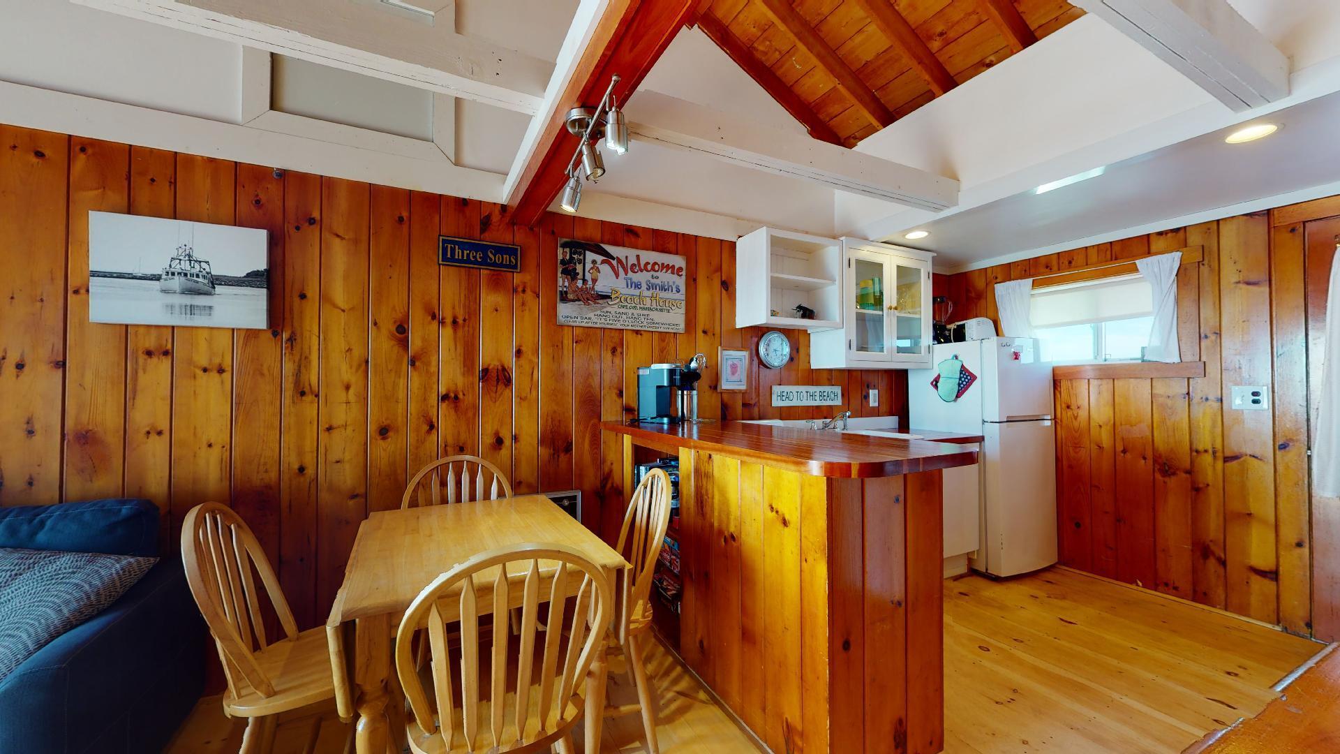 314 Shore Road, Unit 4 5 Truro, MA 02666 - Photo 18 of 50 a dining room with furniture and window