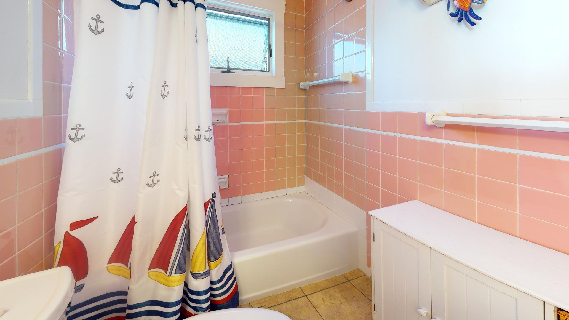 314 Shore Road, Unit 4 5 Truro, MA 02666 - Photo 26 of 50 a bathroom with a sink and a bathtub