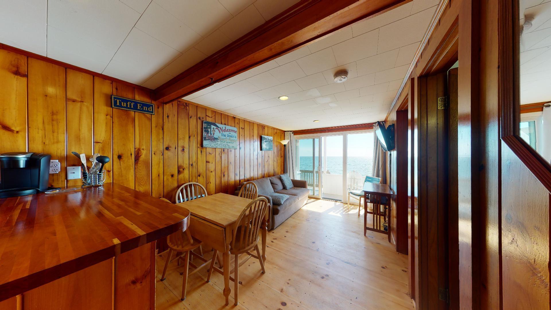 314 Shore Road, Unit 4 5 Truro, MA 02666 - Photo 38 of 50 a view of a dining room with furniture window and outside view