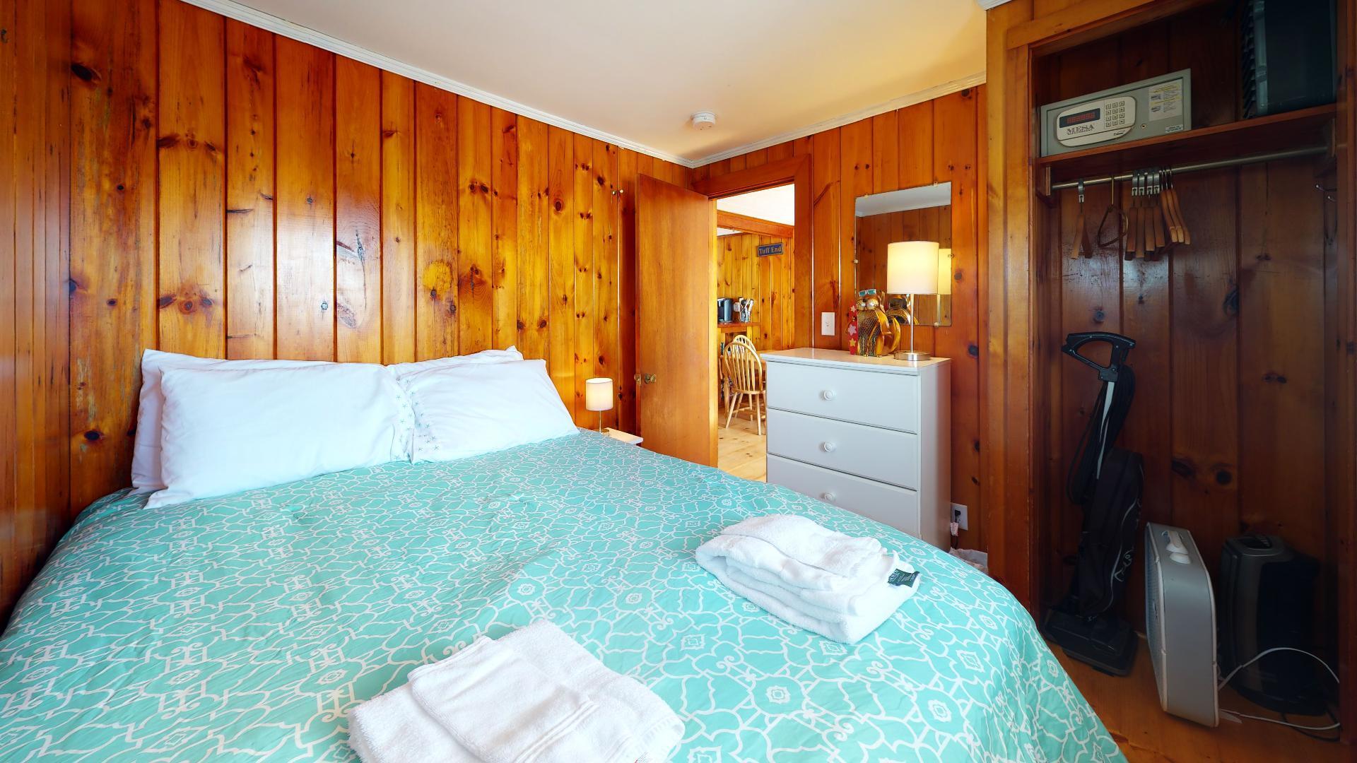 314 Shore Road, Unit 4 5 Truro, MA 02666 - Photo 46 of 50 a bedroom with a bed and a dresser