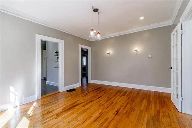 a large kitchen with stainless steel appliances granite countertop a stove a sink and a granite counter tops