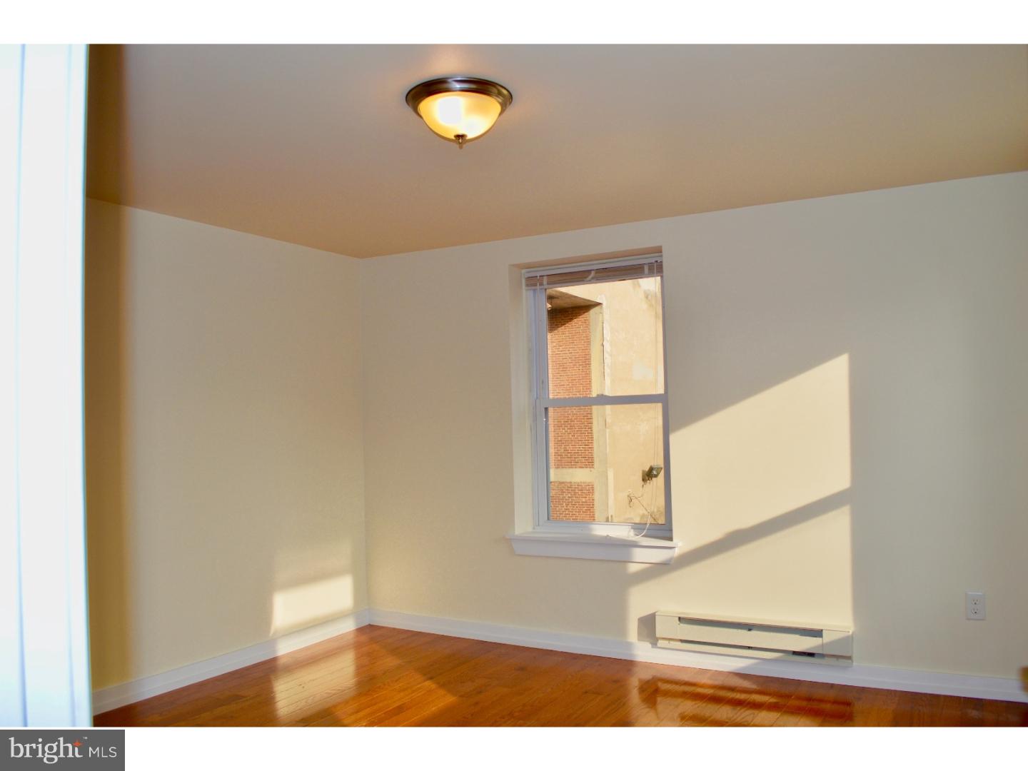 415 South Broad Street, Unit 3F Philadelphia, PA 19147 - Photo 2 of 13 a view of a livingroom with a window