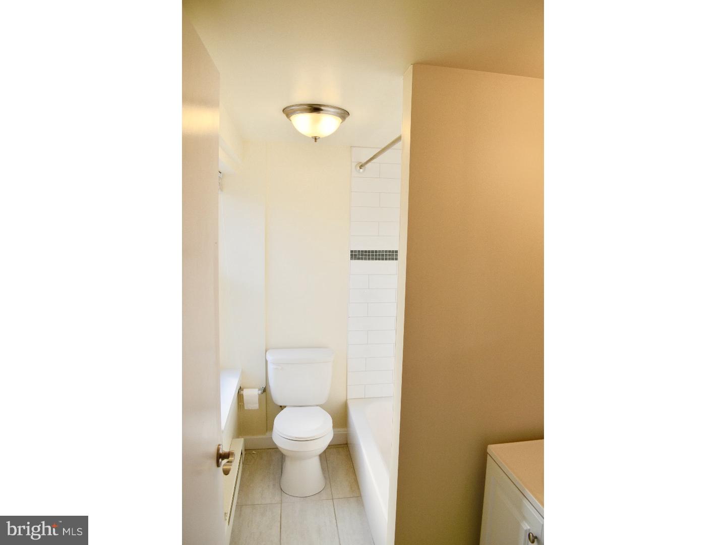 415 South Broad Street, Unit 3F Philadelphia, PA 19147 - Photo 8 of 13 a bathroom with a toilet