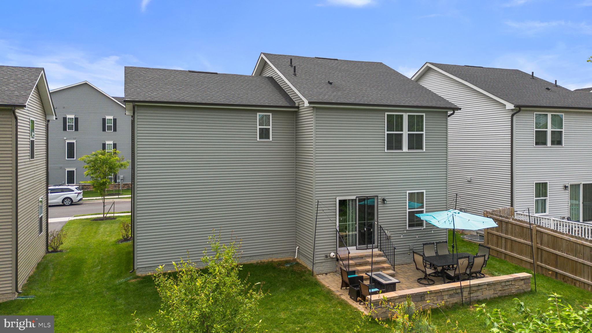 1713 Aurora Way Frederick, MD 21702 - Photo 55 of 57 a view of a house with backyard and sitting area