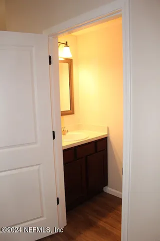 a bathroom with a sink and a vanity