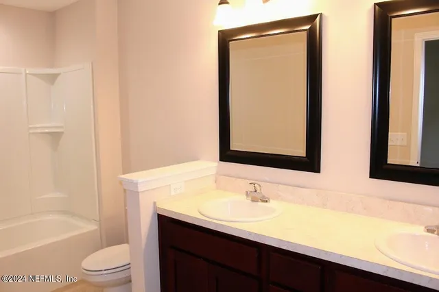 a view of a bathroom with a shower