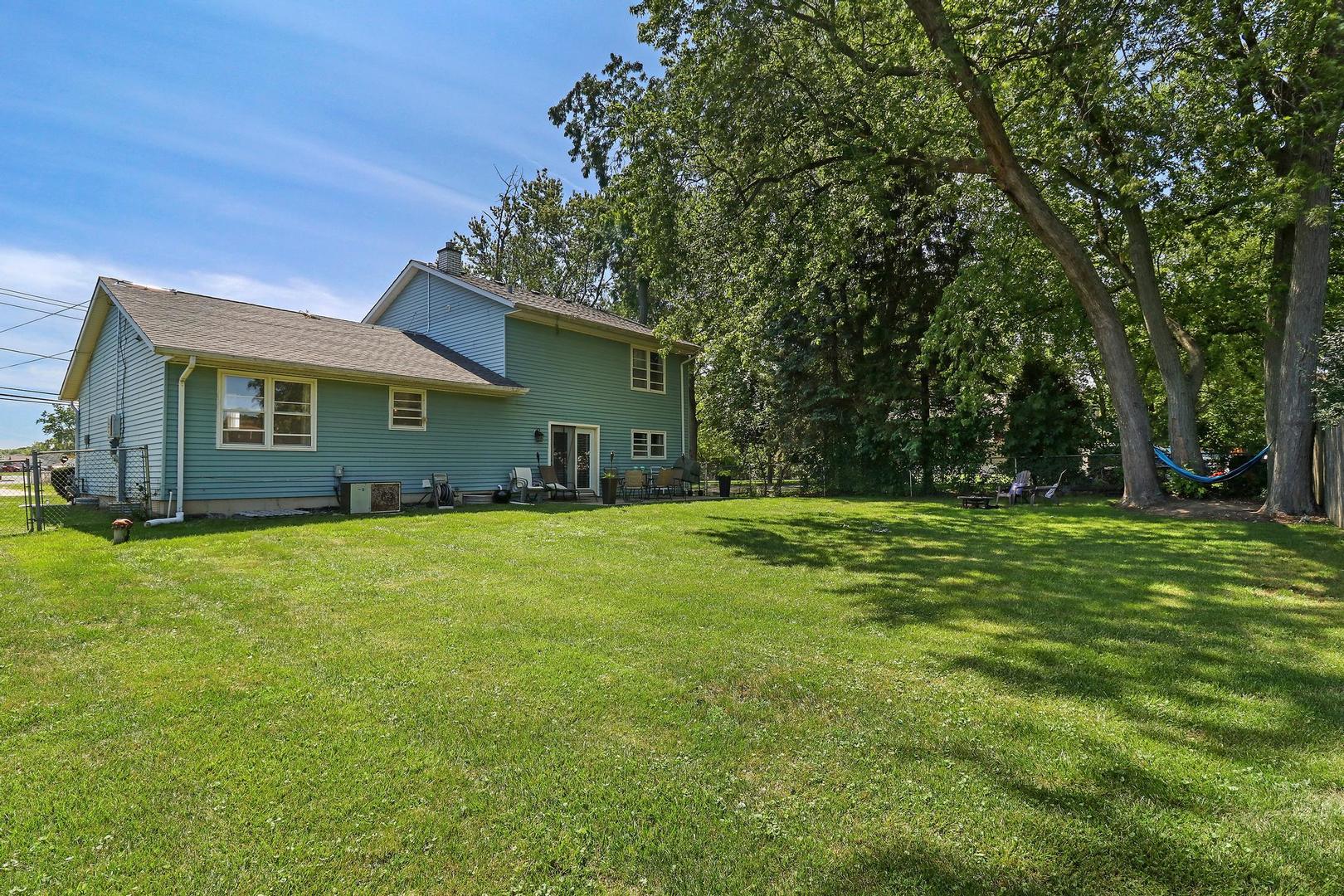 10254 West Beach Road Beach Park, IL 60099 - Photo 2 of 25 a front view of house with yard and green space