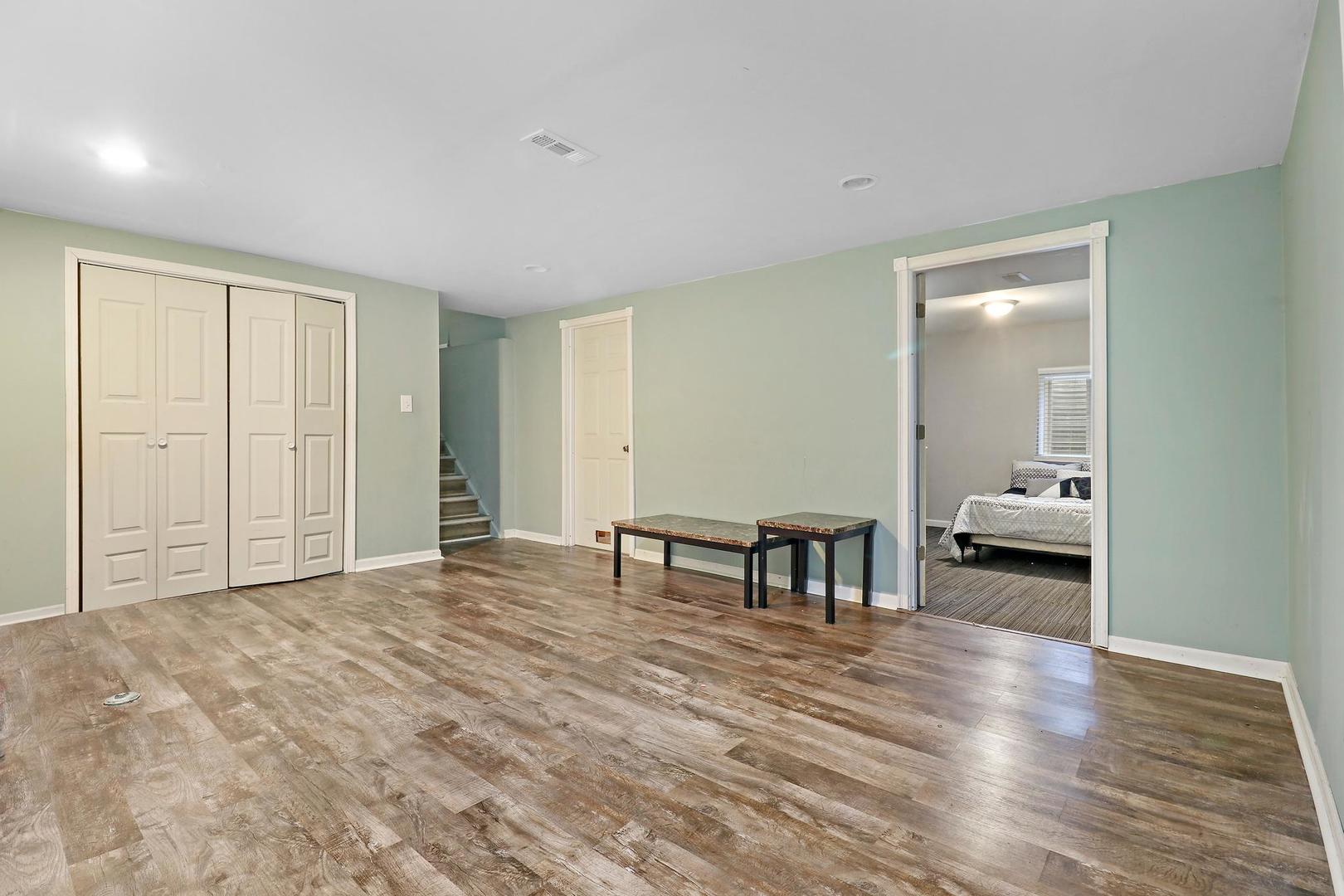 10254 West Beach Road Beach Park, IL 60099 - Photo 21 of 25 a living room with furniture and a table
