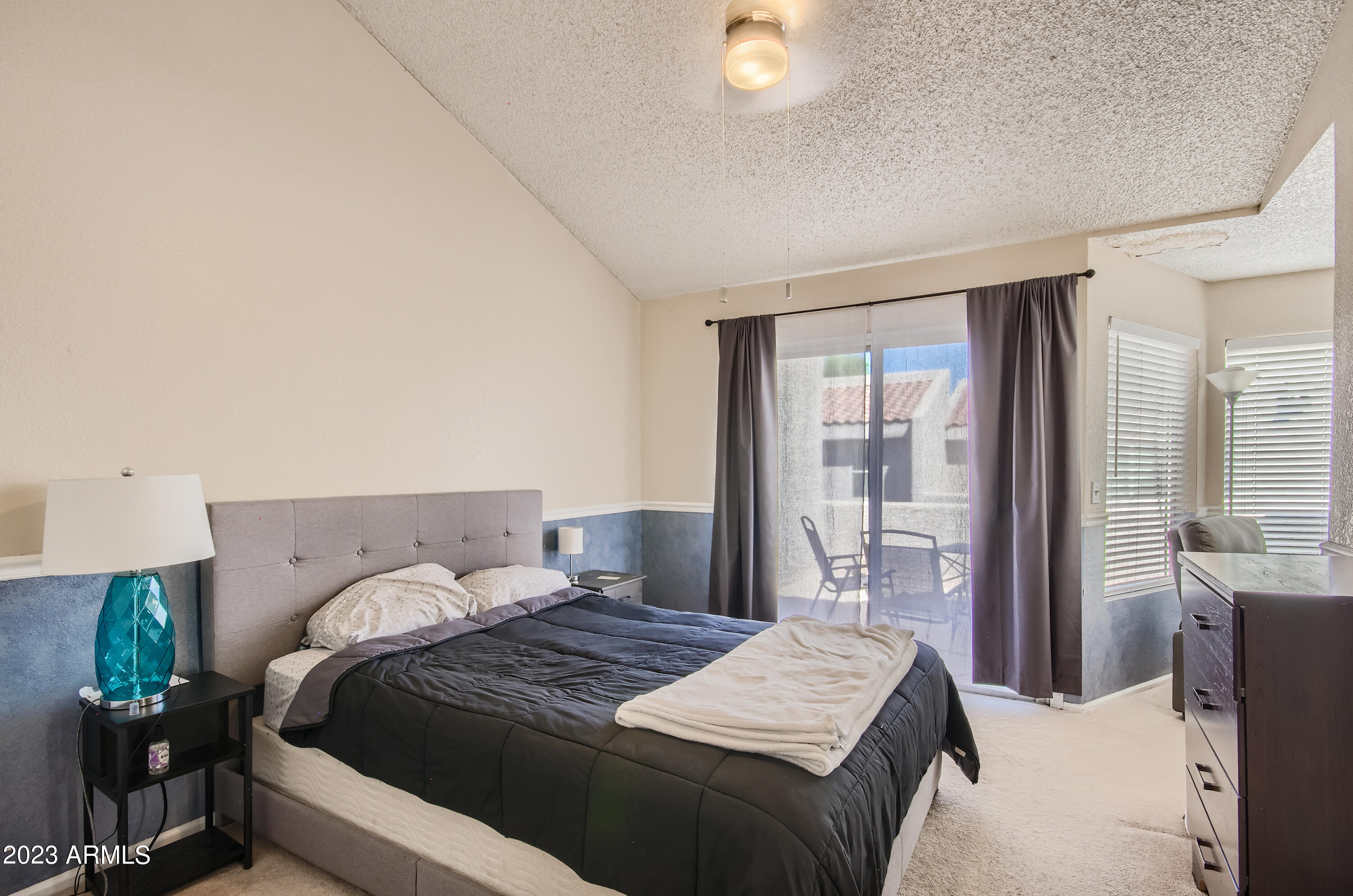 2834 South Ext Road, Unit 2093 Mesa, AZ 85210 - Photo 7 of 17 a bedroom with a bed and a window