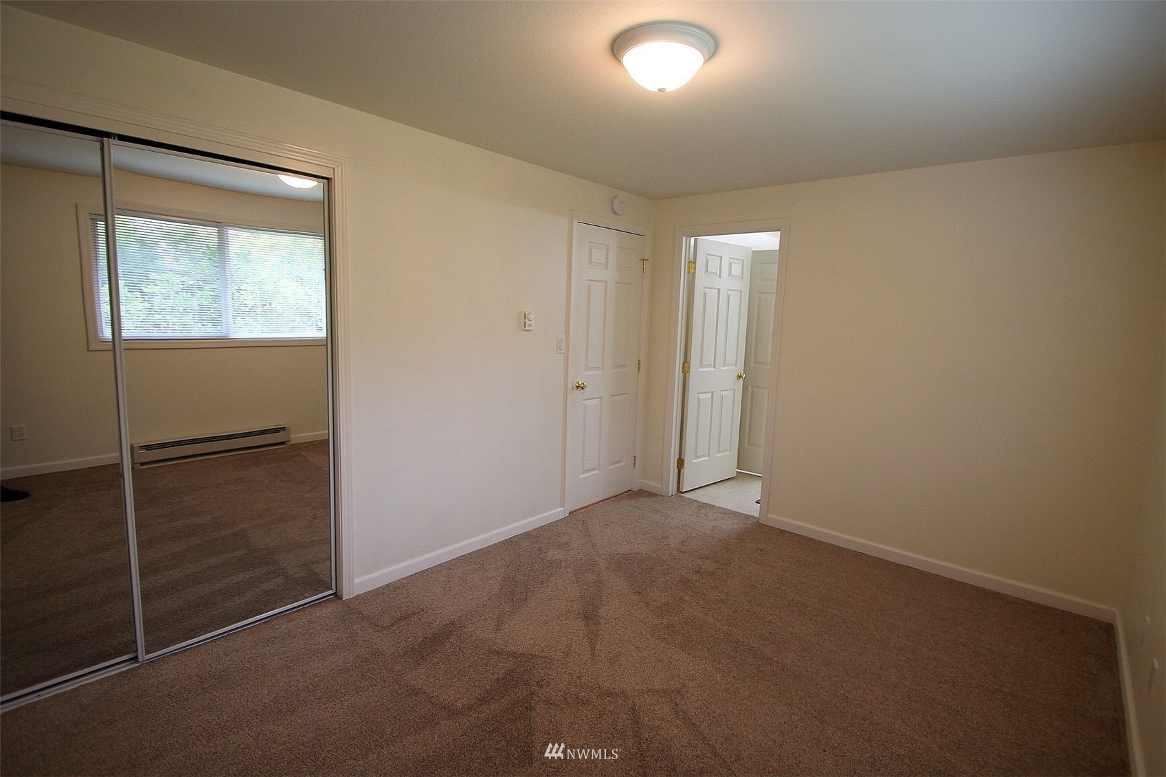 19504 Winesap Lane Bothell, WA 98012 - Photo 17 of 23 an empty room with windows