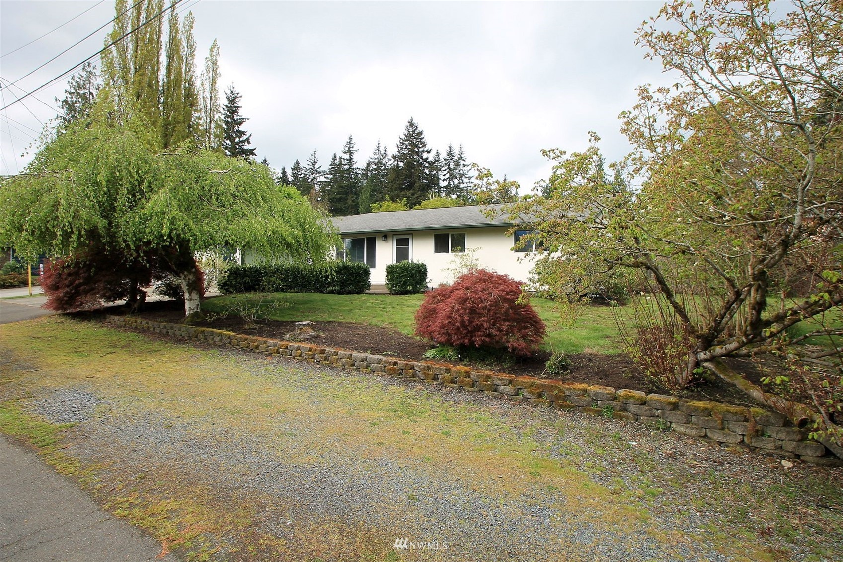 19504 Winesap Lane Bothell, WA 98012 - Photo 23 of 23 a view of a house with backyard and garden