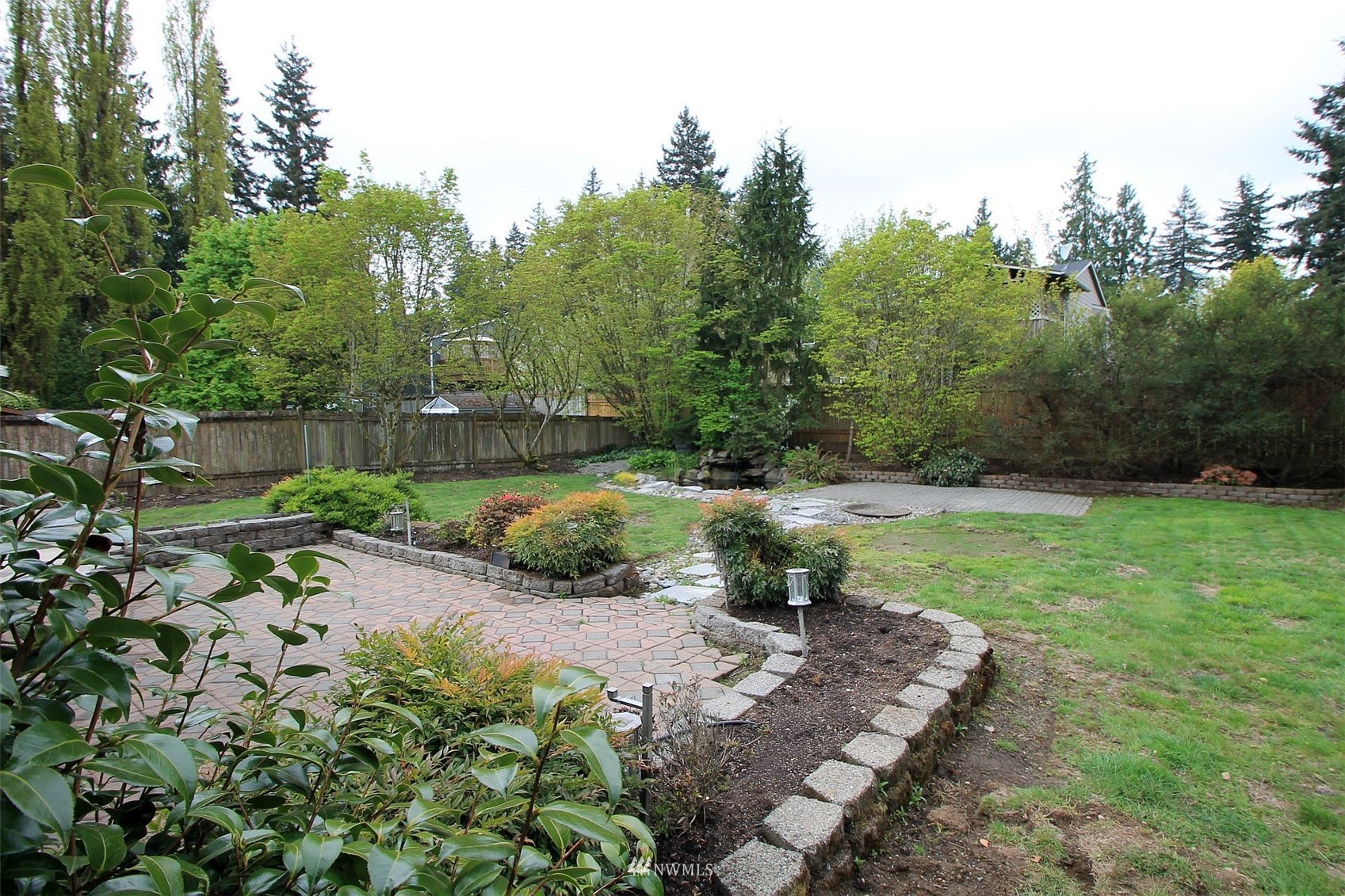 19504 Winesap Lane Bothell, WA 98012 - Photo 4 of 23 a view of a park with large trees
