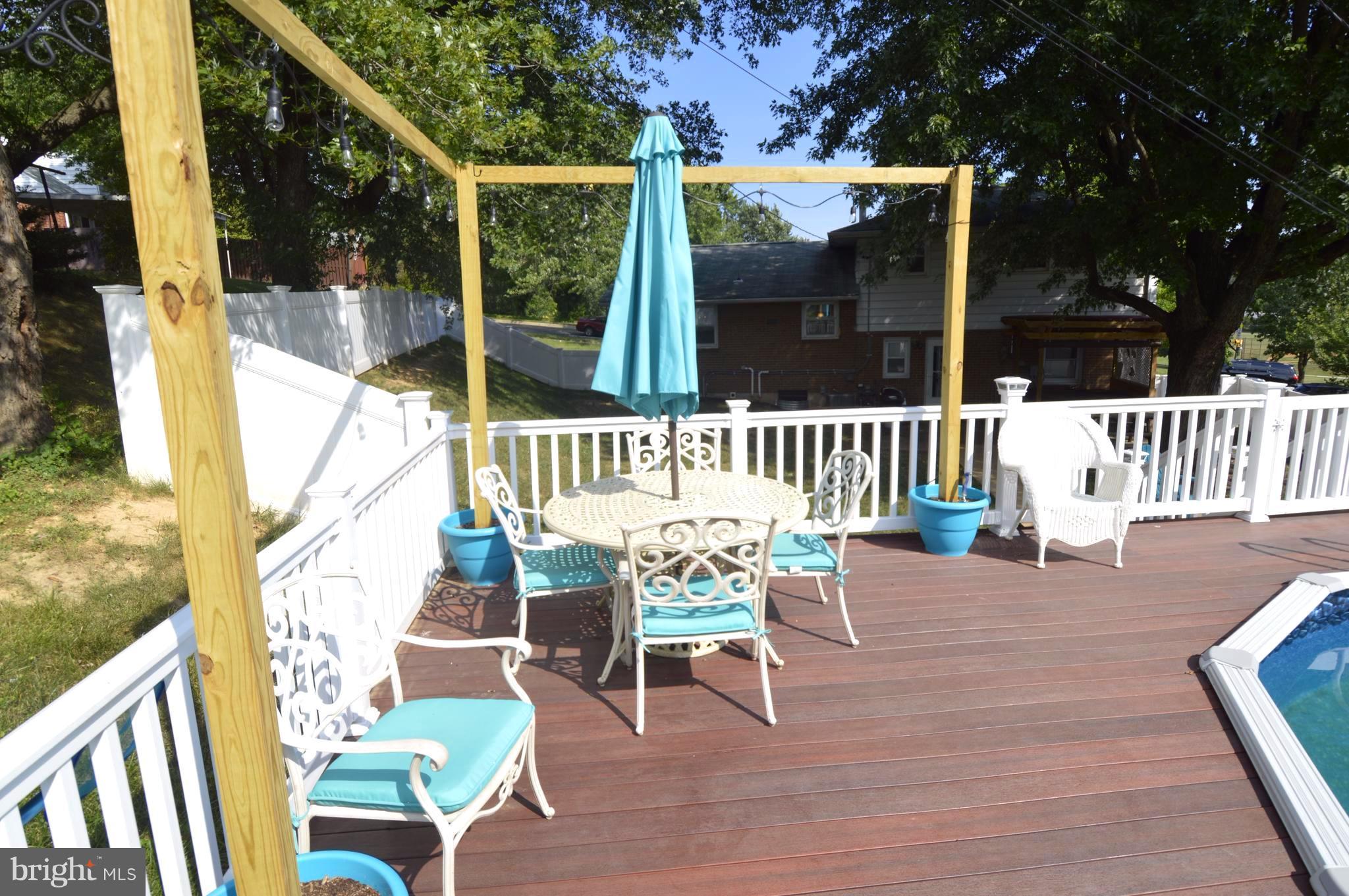 1730 Weyburn Road Baltimore, MD 21237 - Photo 23 of 25 a view of a chair and table in the balcony