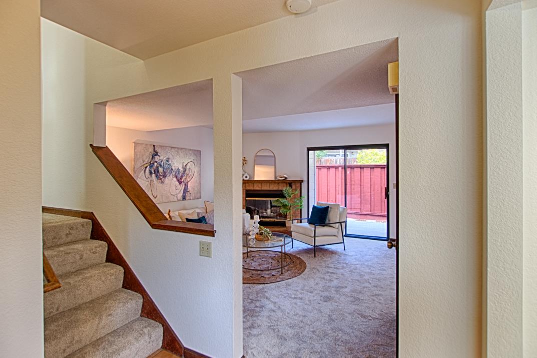 2607 Mallory Lane Santa Cruz, CA 95065 - Photo 14 of 31 a living room with furniture and a fireplace