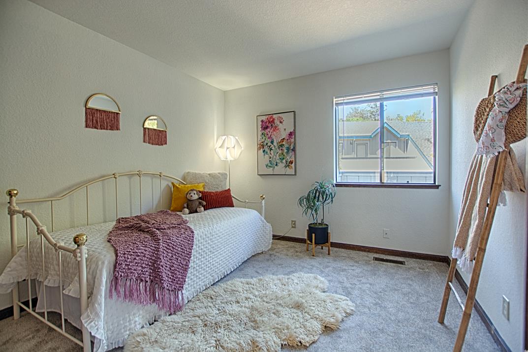 2607 Mallory Lane Santa Cruz, CA 95065 - Photo 20 of 31 a bed room with a bed and a window