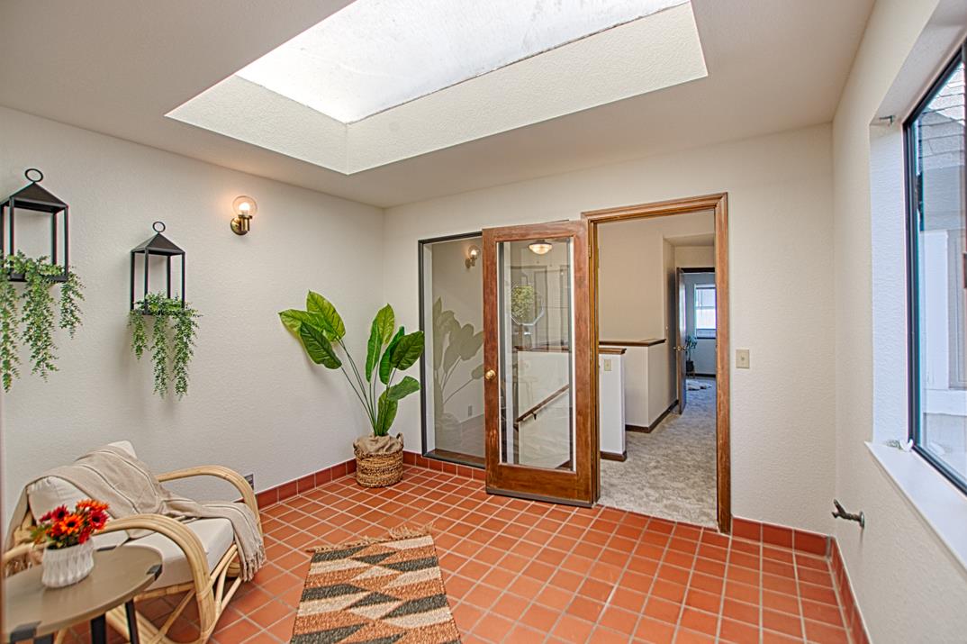 2607 Mallory Lane Santa Cruz, CA 95065 - Photo 23 of 31 a view of a bedroom with bed and hallway