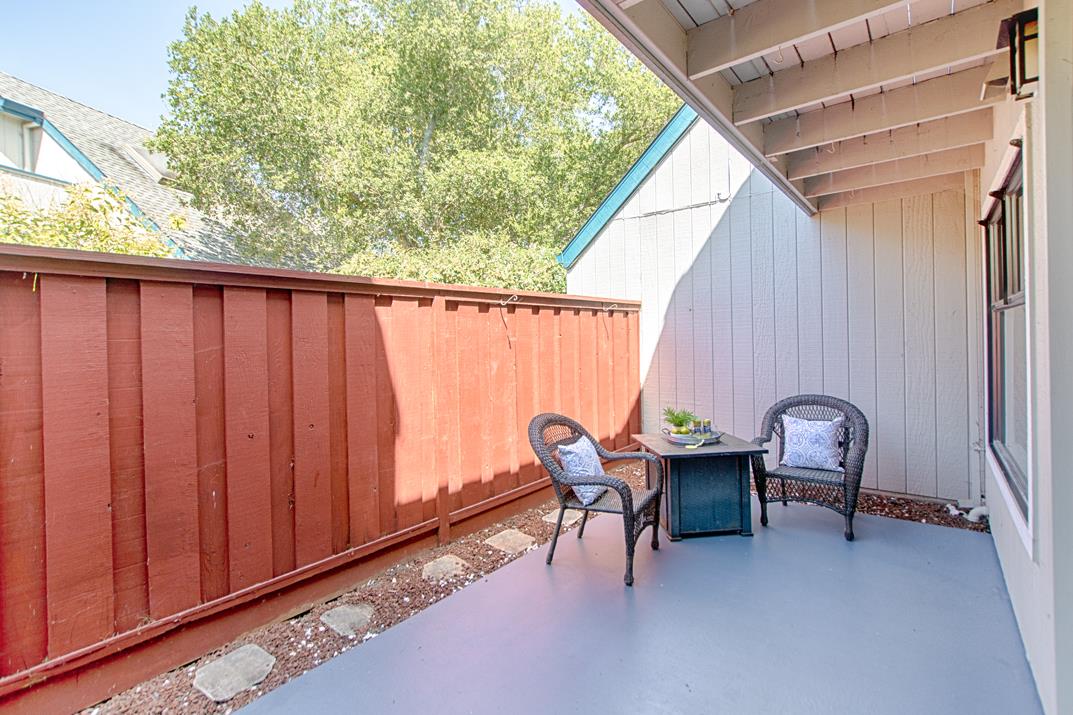 2607 Mallory Lane Santa Cruz, CA 95065 - Photo 25 of 31 a backyard of a house with table and chairs