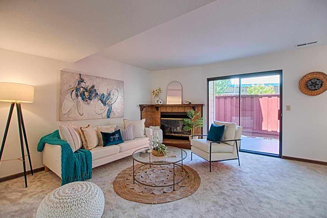 2607 Mallory Lane Santa Cruz, CA 95065 - Photo 4 of 31 a living room with furniture a rug and a window