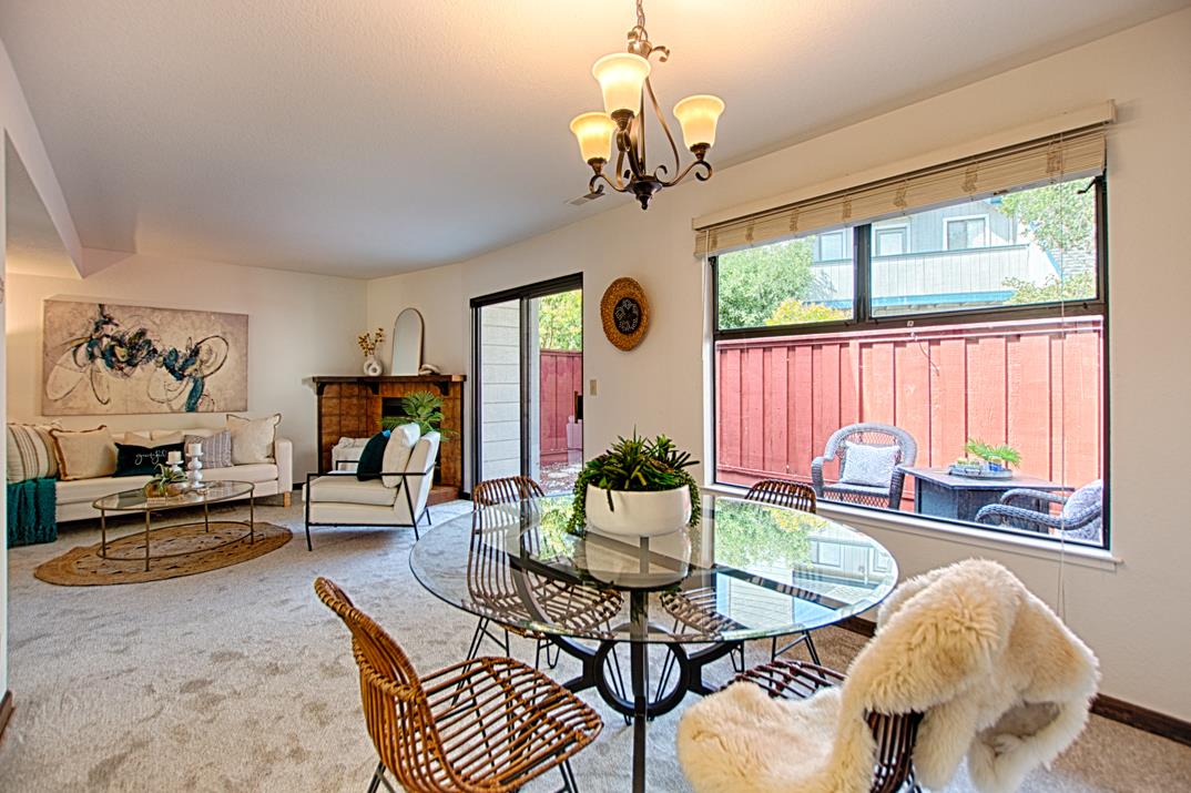 2607 Mallory Lane Santa Cruz, CA 95065 - Photo 6 of 31 a living room with fireplace furniture and a chandelier