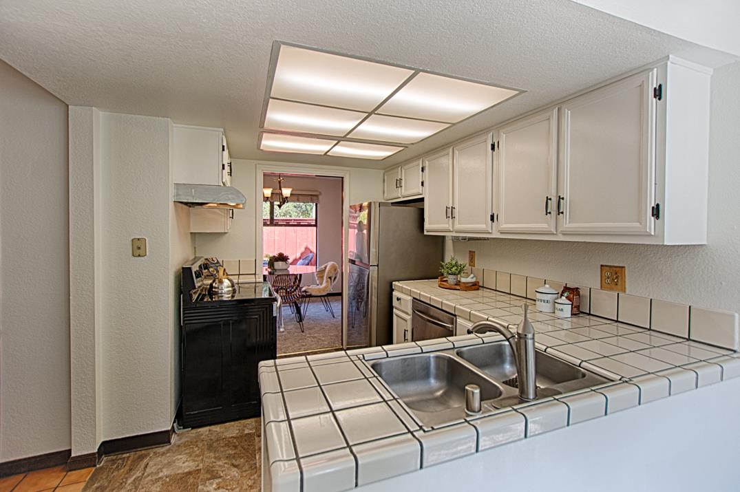 2607 Mallory Lane Santa Cruz, CA 95065 - Photo 10 of 31 a kitchen with a stove and a refrigerator