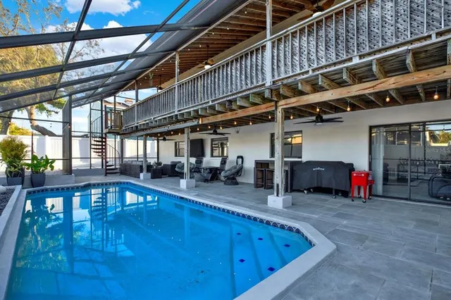 a view of a balcony with wooden floor