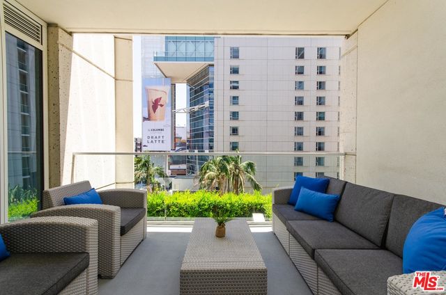 a living room with furniture and a bathtub