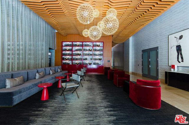 a view of swimming pool with outdoor seating