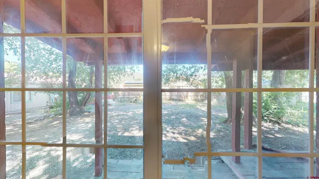 a view of a room and window