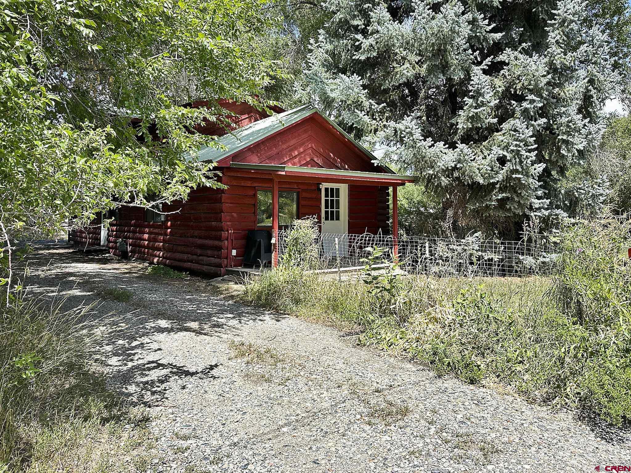 438 Stahl Road Paonia, CO 81428 - Photo 31 of 33 a front view of a house with garden