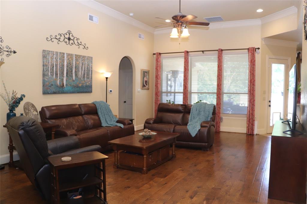 5614 Pleasant Ridge Road Dallas, TX 75236 - Photo 2 of 23 a living room with furniture and a large window