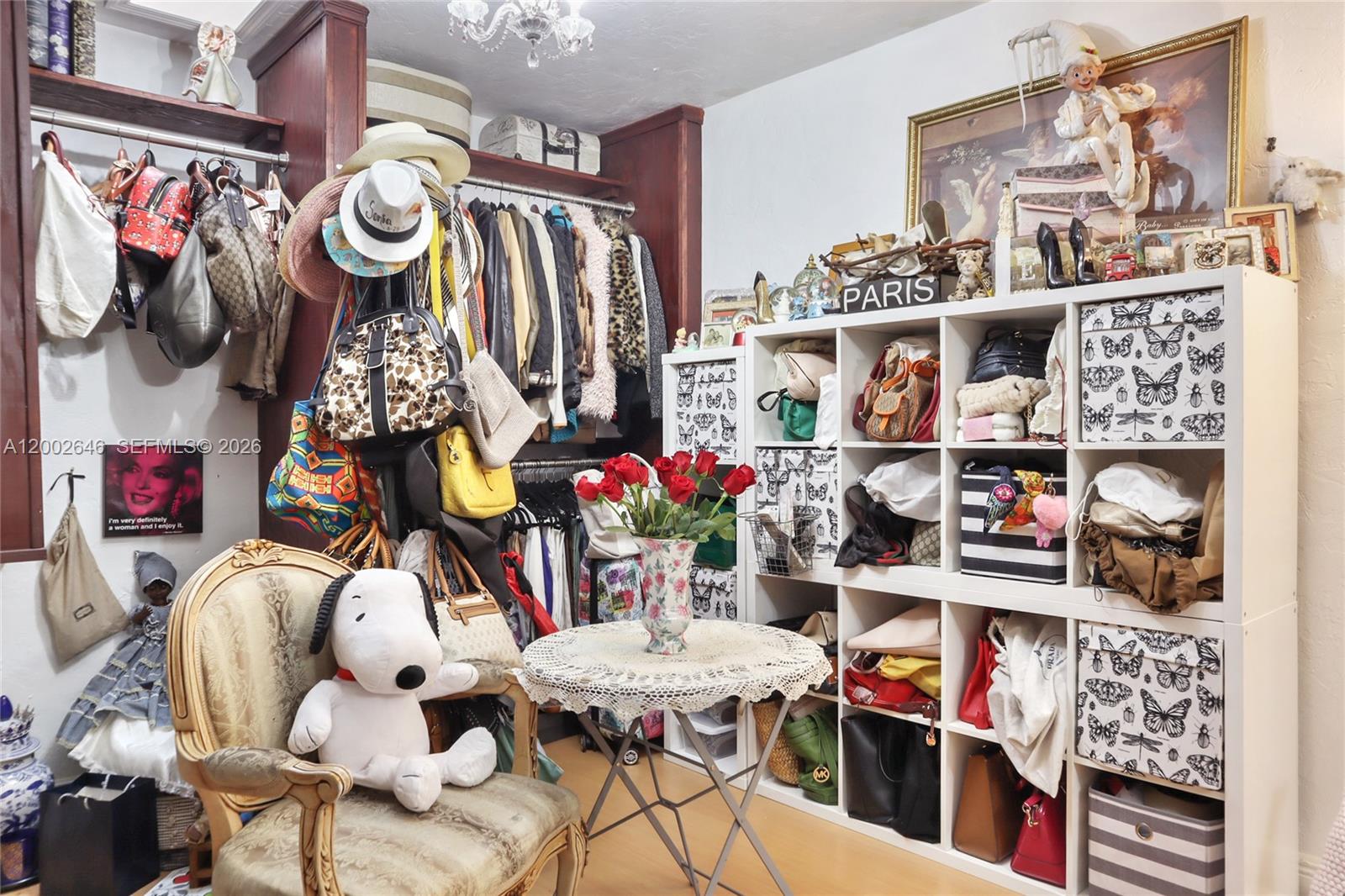 619 Southwest 39th Avenue Miami, FL 33134 - Photo 13 of 24 a view of walk in closet with clothes and shoes